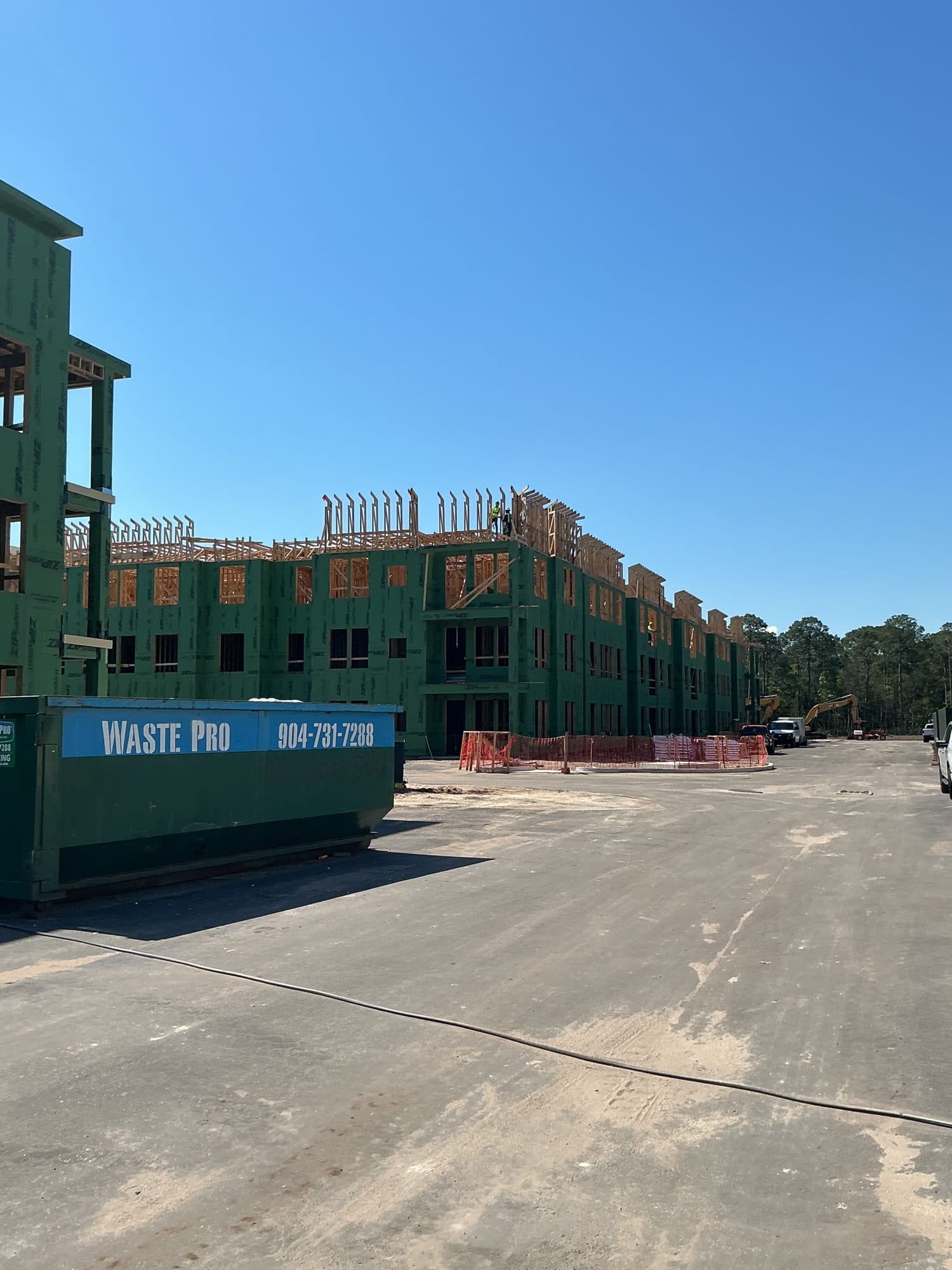 Multifamily apartment buildings at frame stage during construction